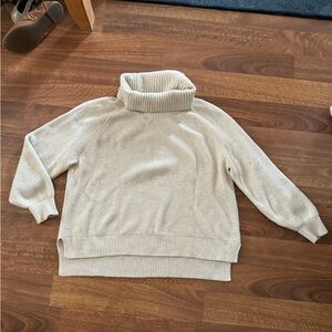 Super soft straw colored cowl neck sweater.